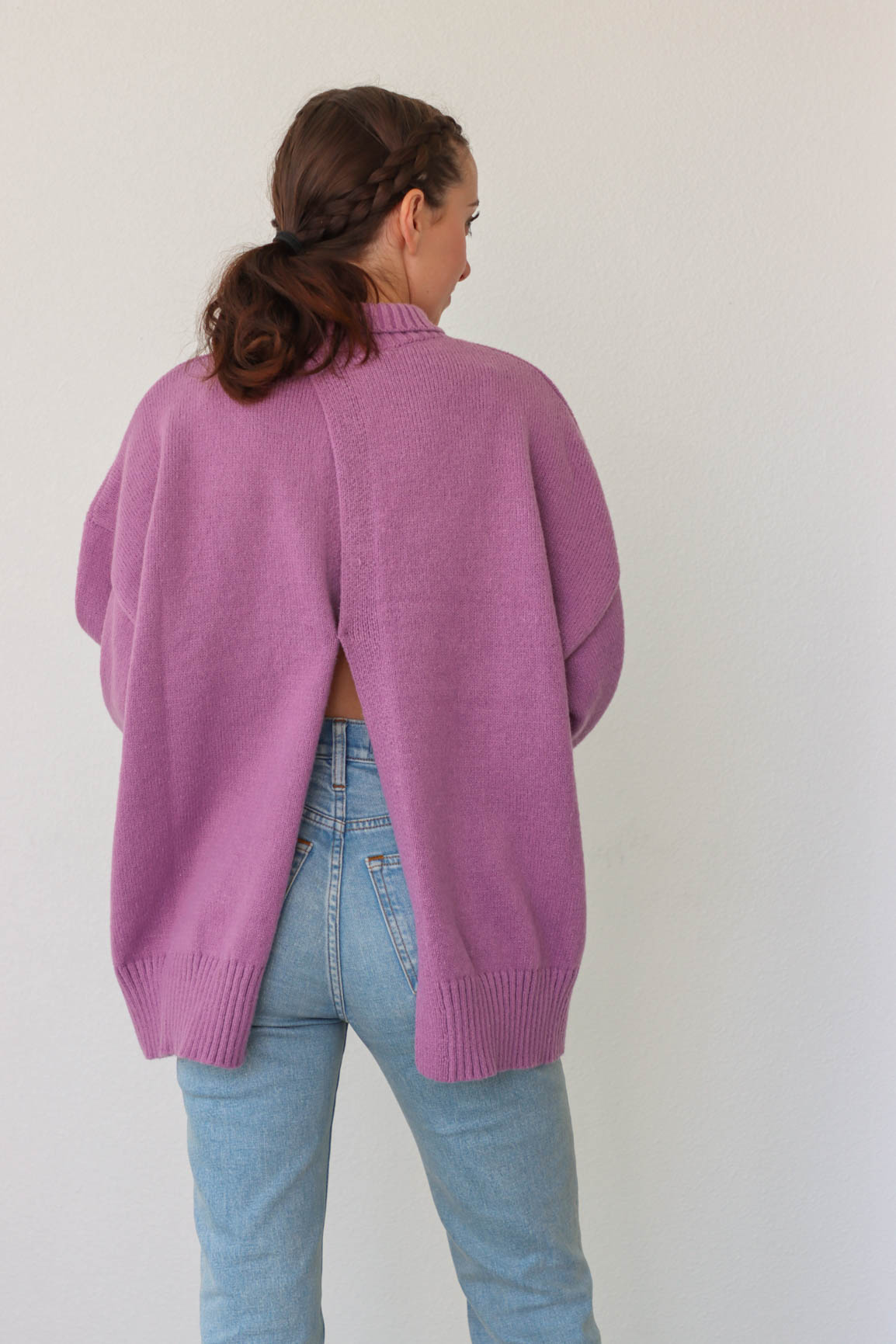 girl wearing purple turtleneck sweater