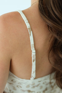 Close-up of a woman wearing adjustable straps 