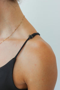 adjustable straps on black athletic dress
