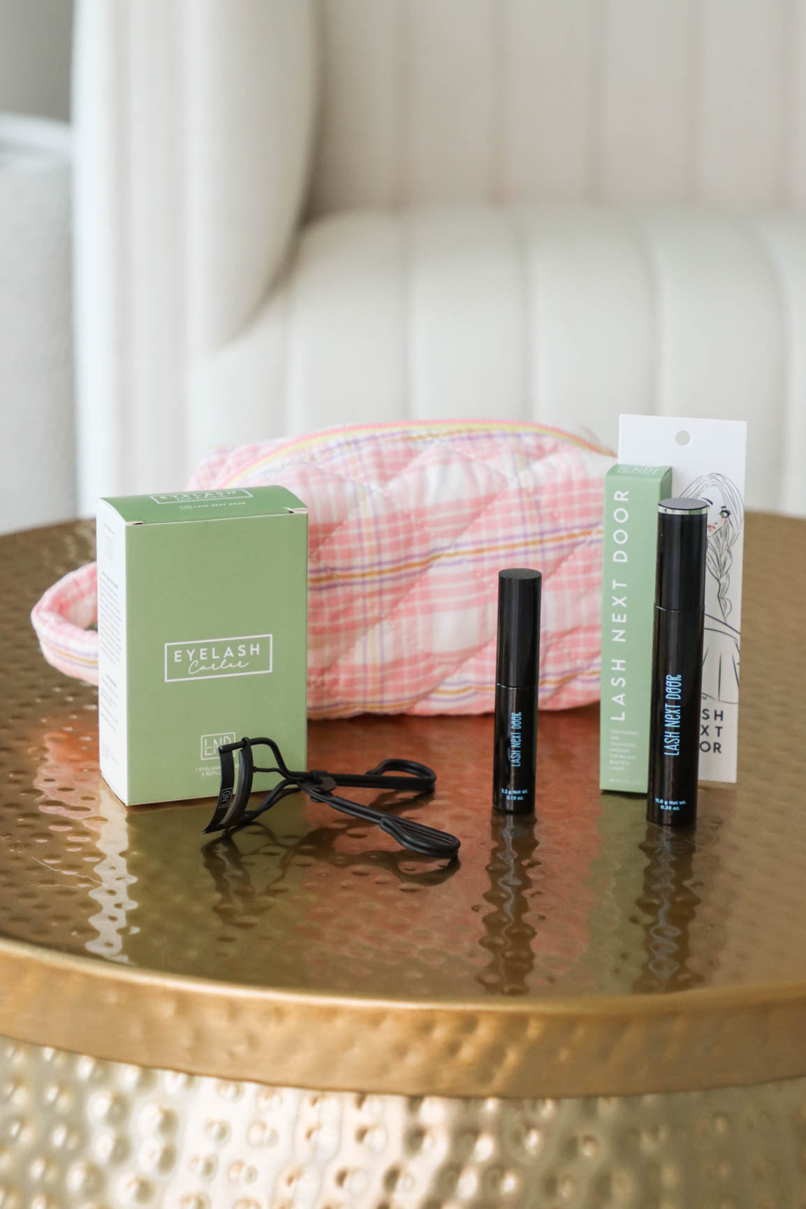 pink full package bundle: curler, mascara, mini mascara, and makeup bag