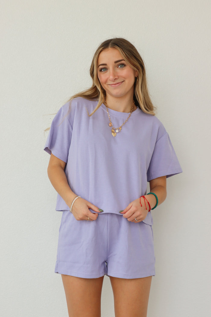 girl wearing light purple lounge set