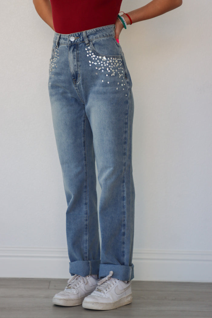 girl wearing jeans with rhinestone detailing