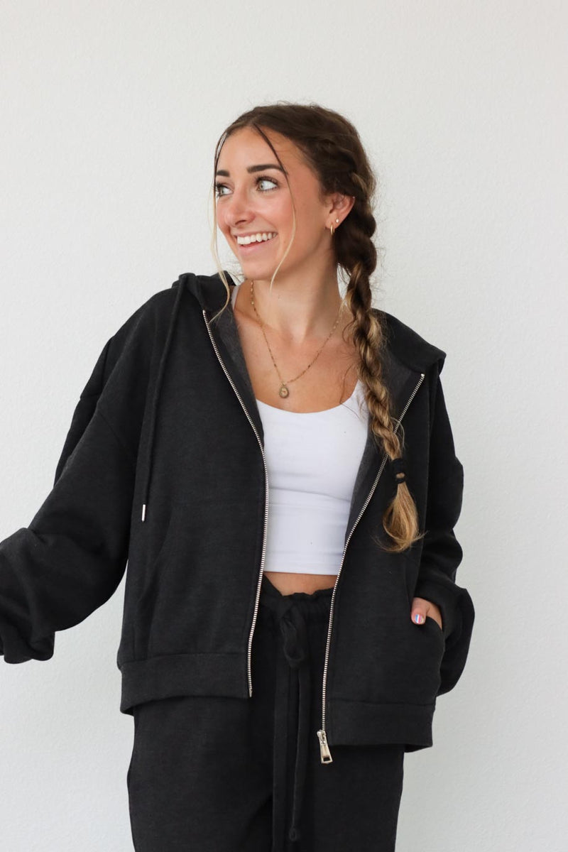 girl wearing dark gray hoodie