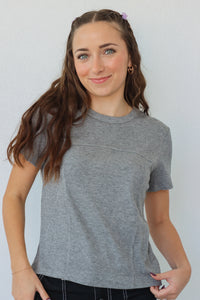 girl wearing gray t-shirt