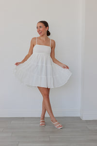 girl wearing white short dress 