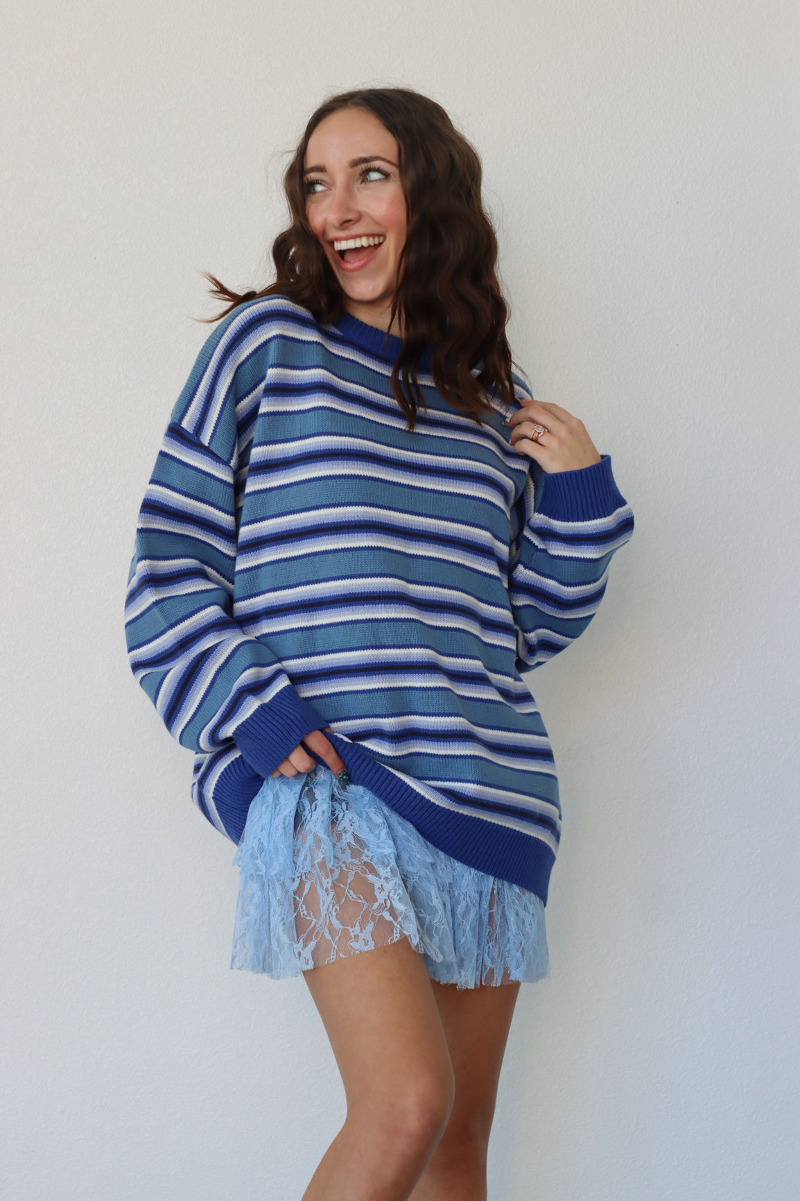 girl wearing blue striped sweater