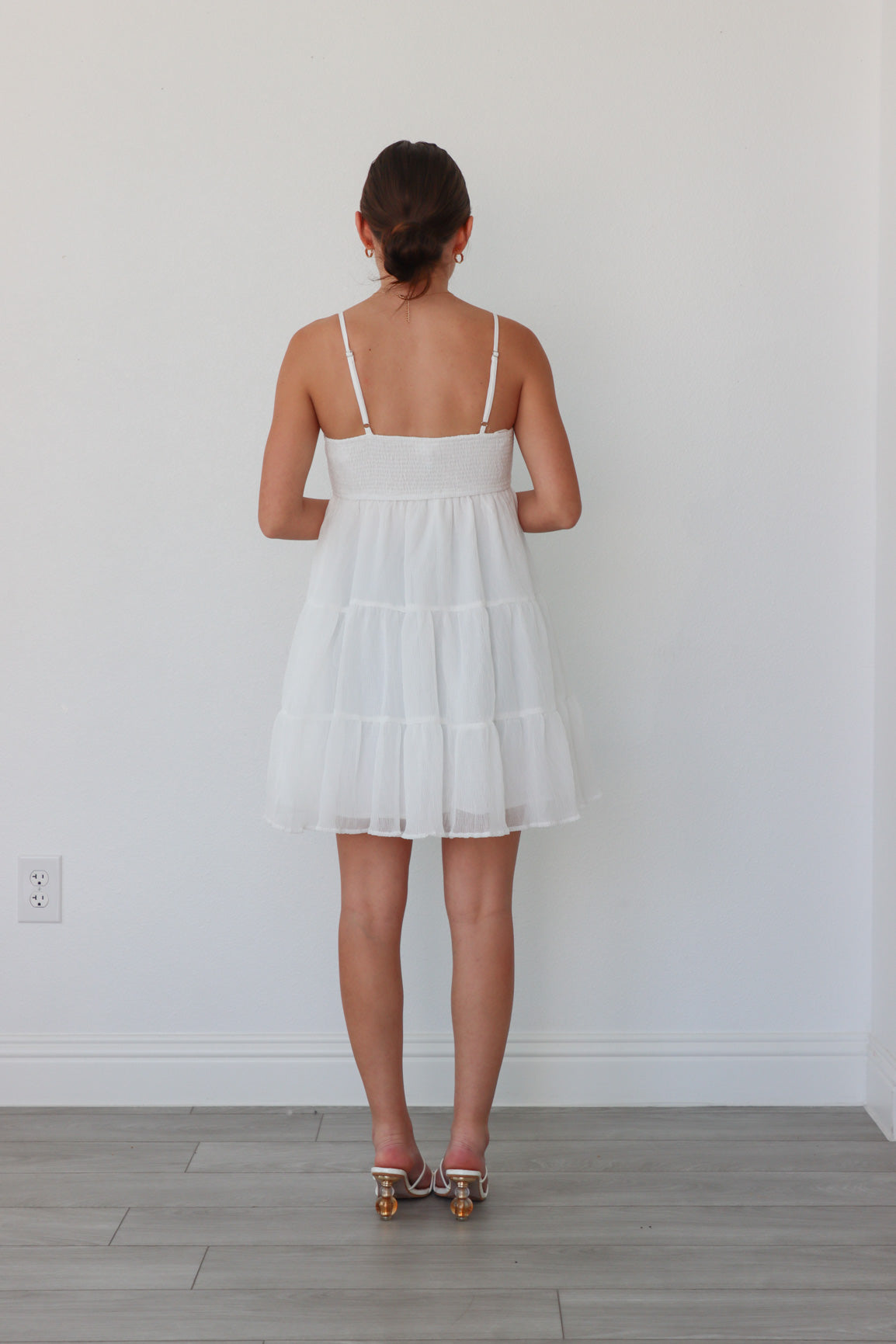 girl wearing white short dress 