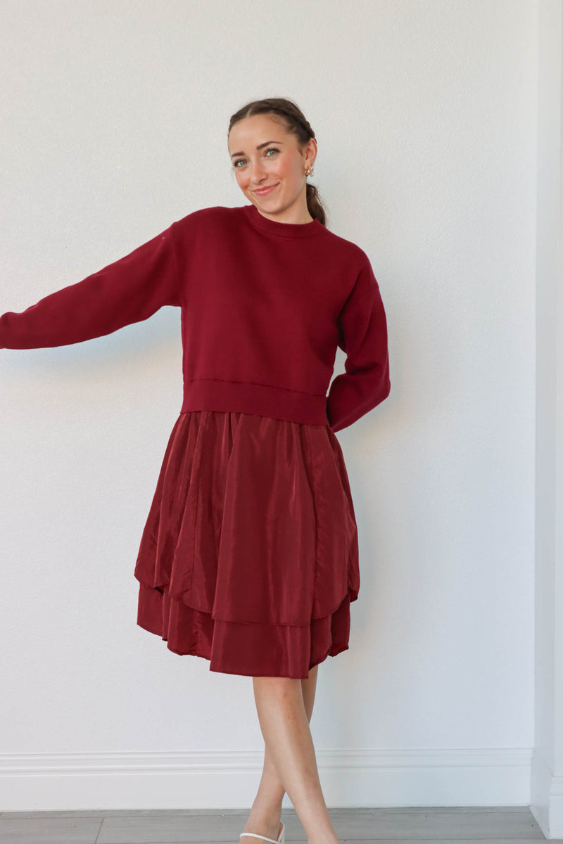 girl wearing red sweater dress