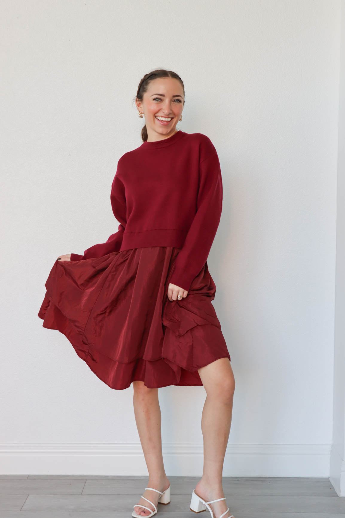 girl wearing red sweater dress