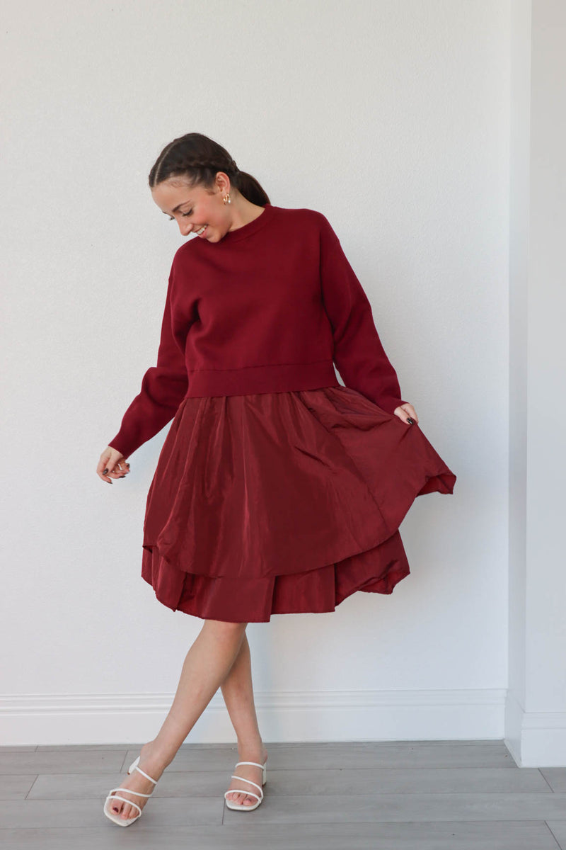 girl wearing red sweater dress