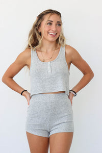 girl wearing gray knit matching lounge set: tank and shorts