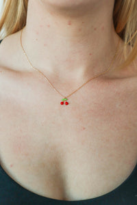 red cherry necklace with gold chain