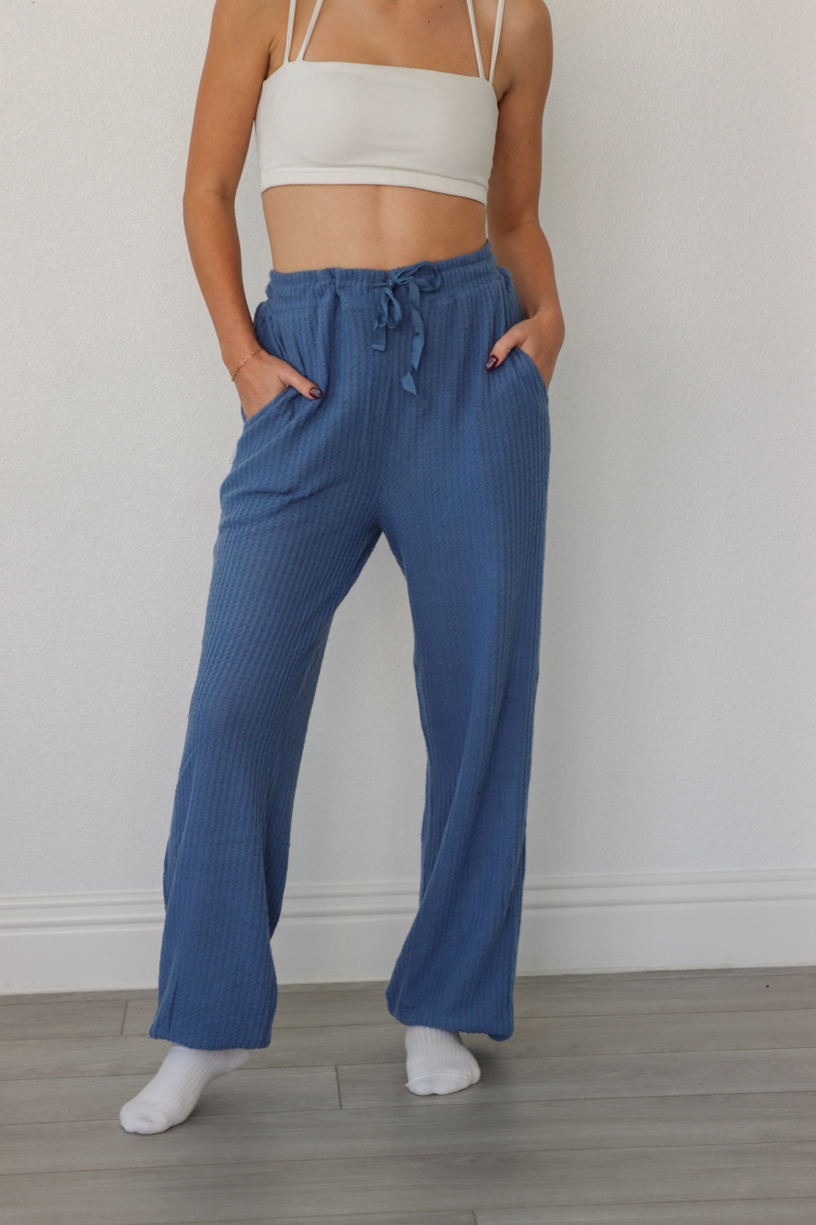 girl wearing blue waffle knit lounge pants