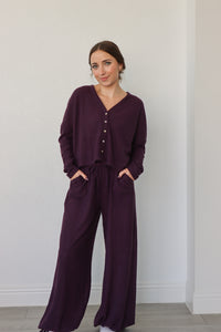 girl wearing dark purple waffle knit lounge set