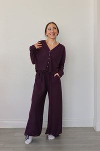 girl wearing dark purple waffle knit lounge set