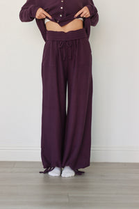 girl wearing dark purple waffle knit lounge set