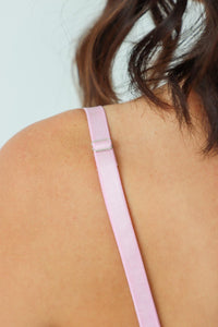 adjustable straps on pink corset top