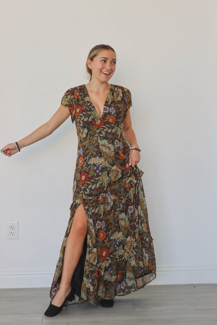 girl wearing black floral maxi dress