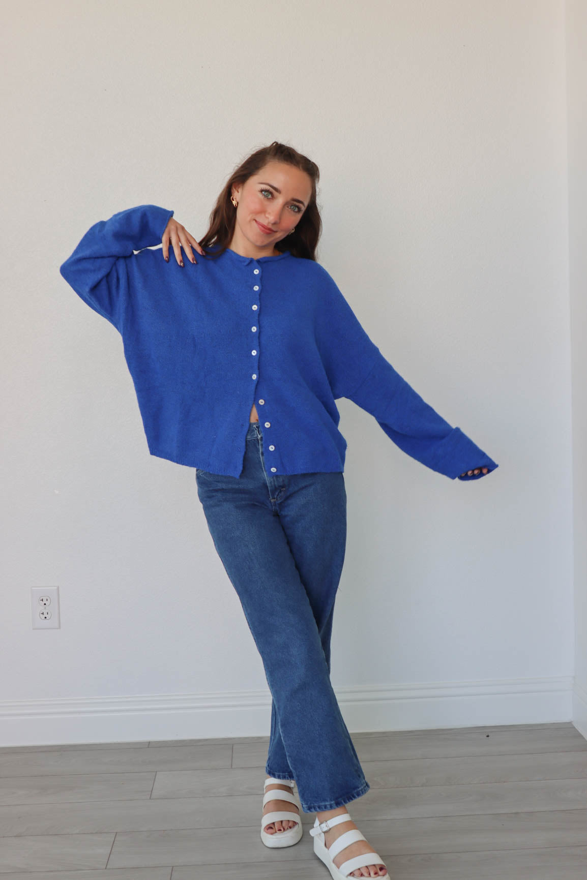 girl wearing royal blue cardigan