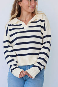 girl wearing knit striped pullover