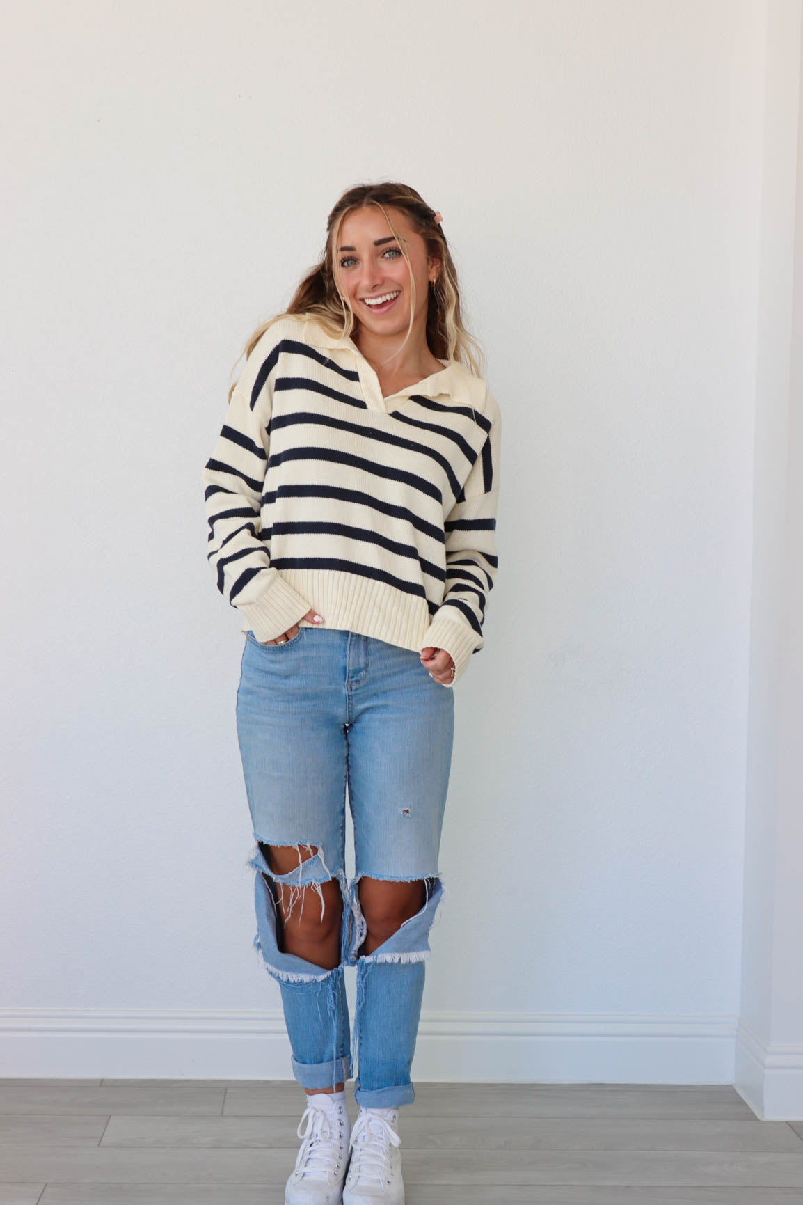 girl wearing knit striped pullover