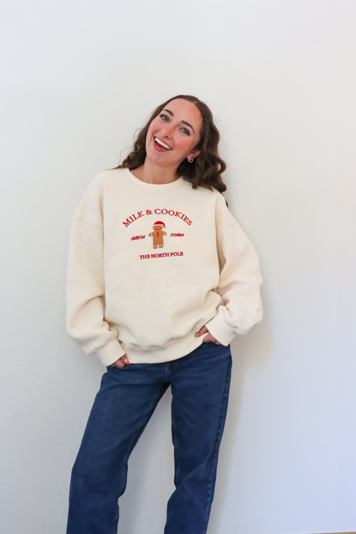 girl wearing cream milk & cookies crewneck