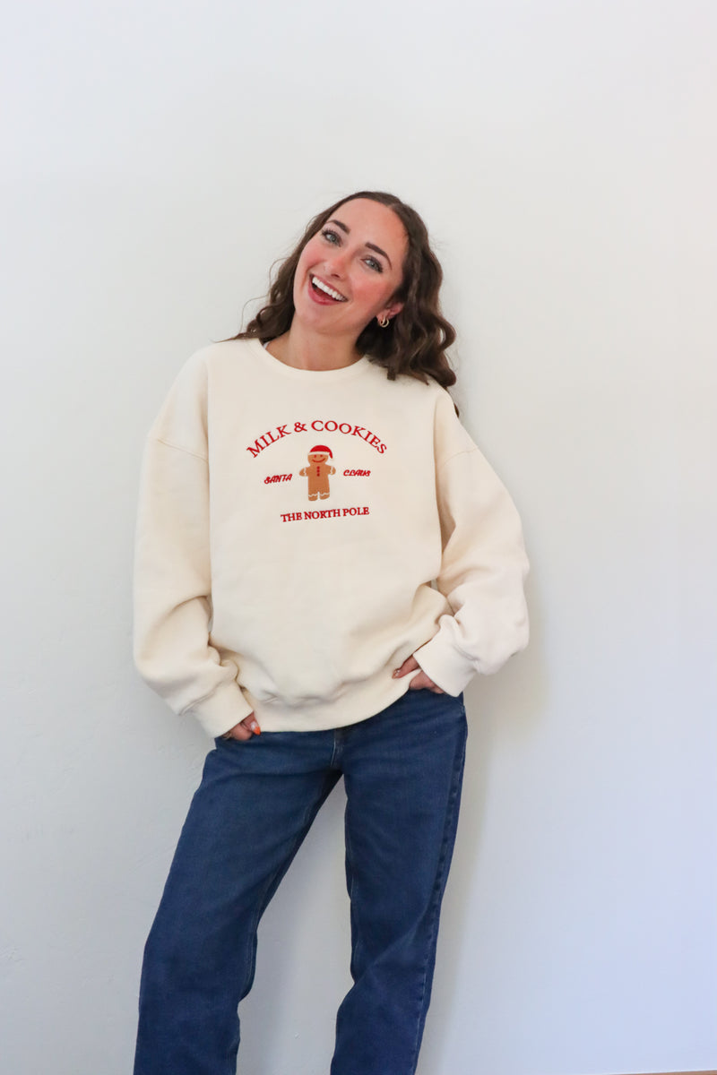 girl wearing cream milk & cookies crewneck