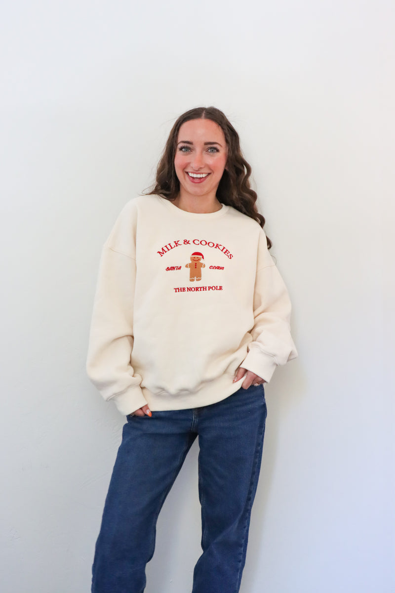 girl wearing cream milk & cookies crewneck
