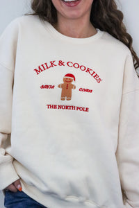 girl wearing cream milk & cookies crewneck