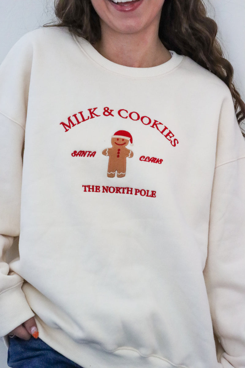 girl wearing cream milk & cookies crewneck