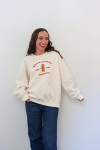 girl wearing cream milk & cookies crewneck