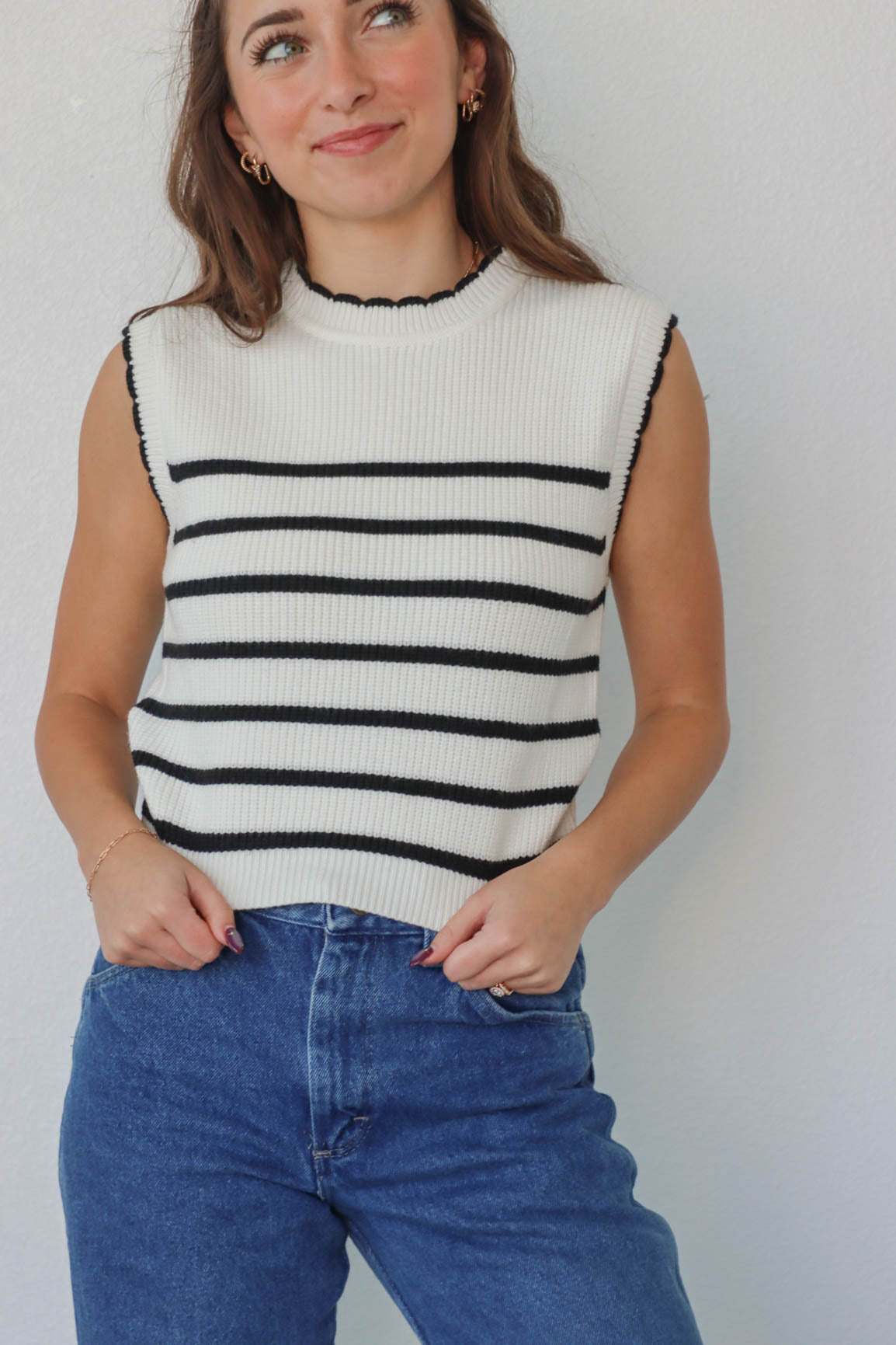 girl wearing white & black knit tank top