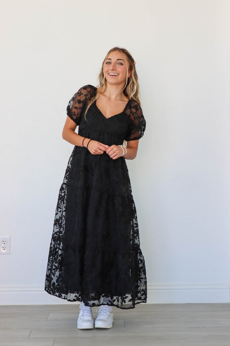 girl wearing black long lace dress