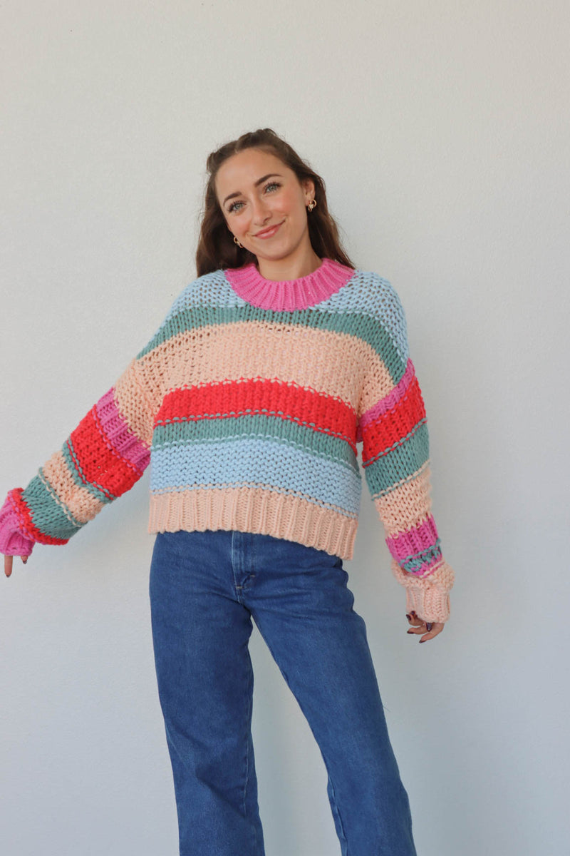 girl wearing multicolor knit chunky sweater