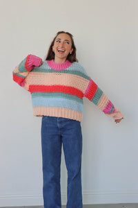 girl wearing multicolor knit chunky sweater