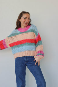 girl wearing multicolor knit chunky sweater