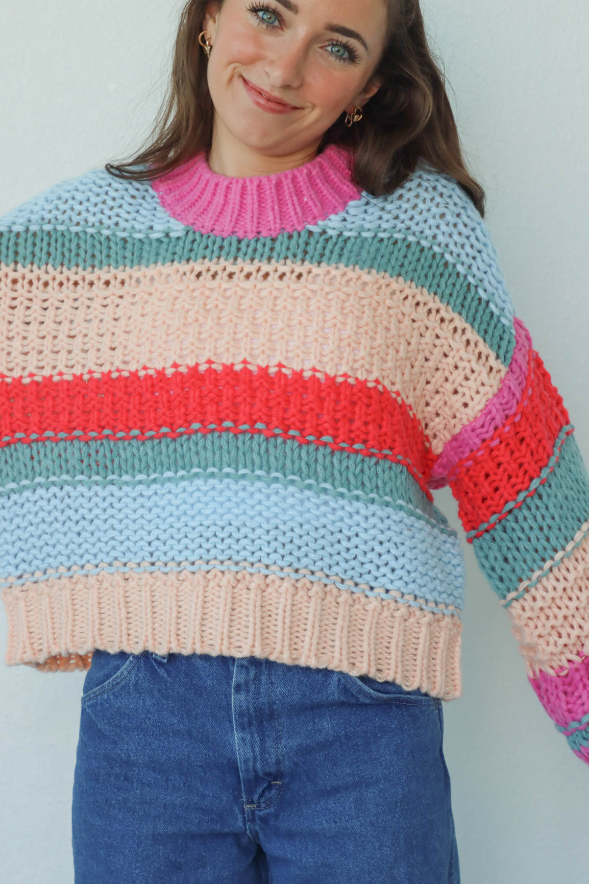 girl wearing multicolor knit chunky sweater