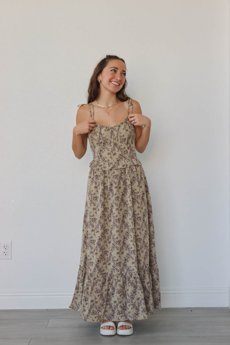 girl wearing tan & brown floral maxi dress