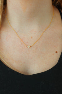 dainty gold flower necklace