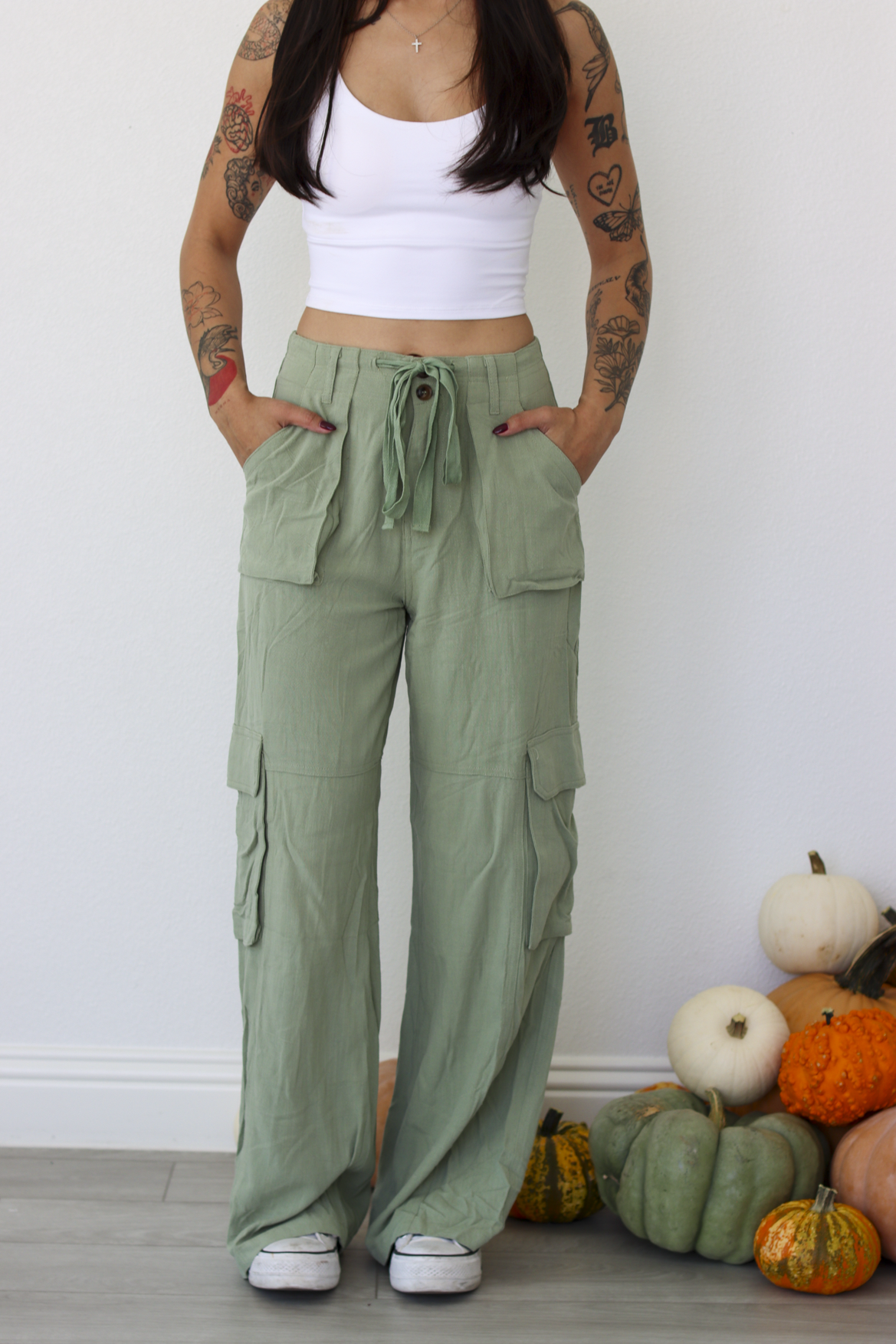 Woman wearing green wide leg cargo pants 