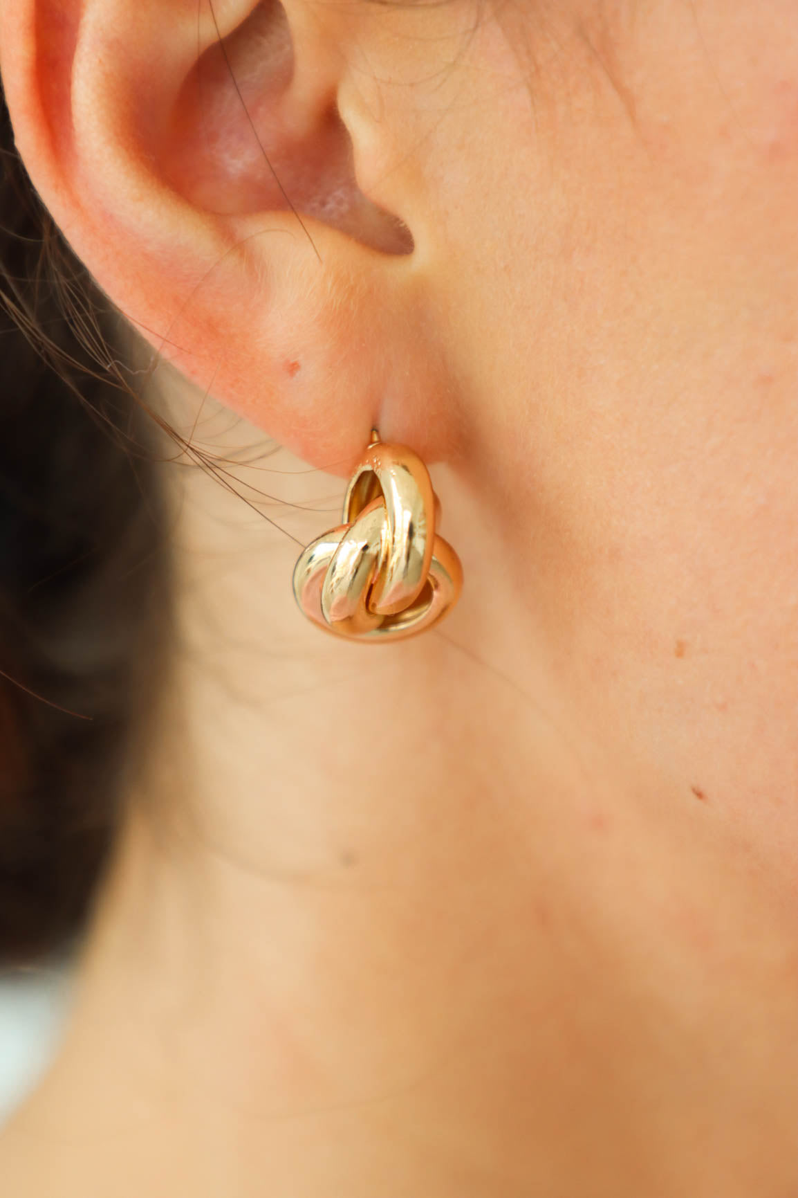 gold knot stud earrings
