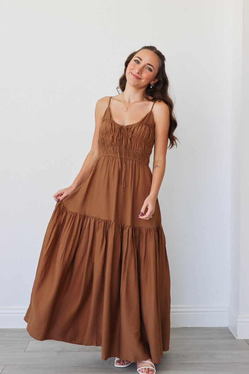 girl wearing brown maxi dress