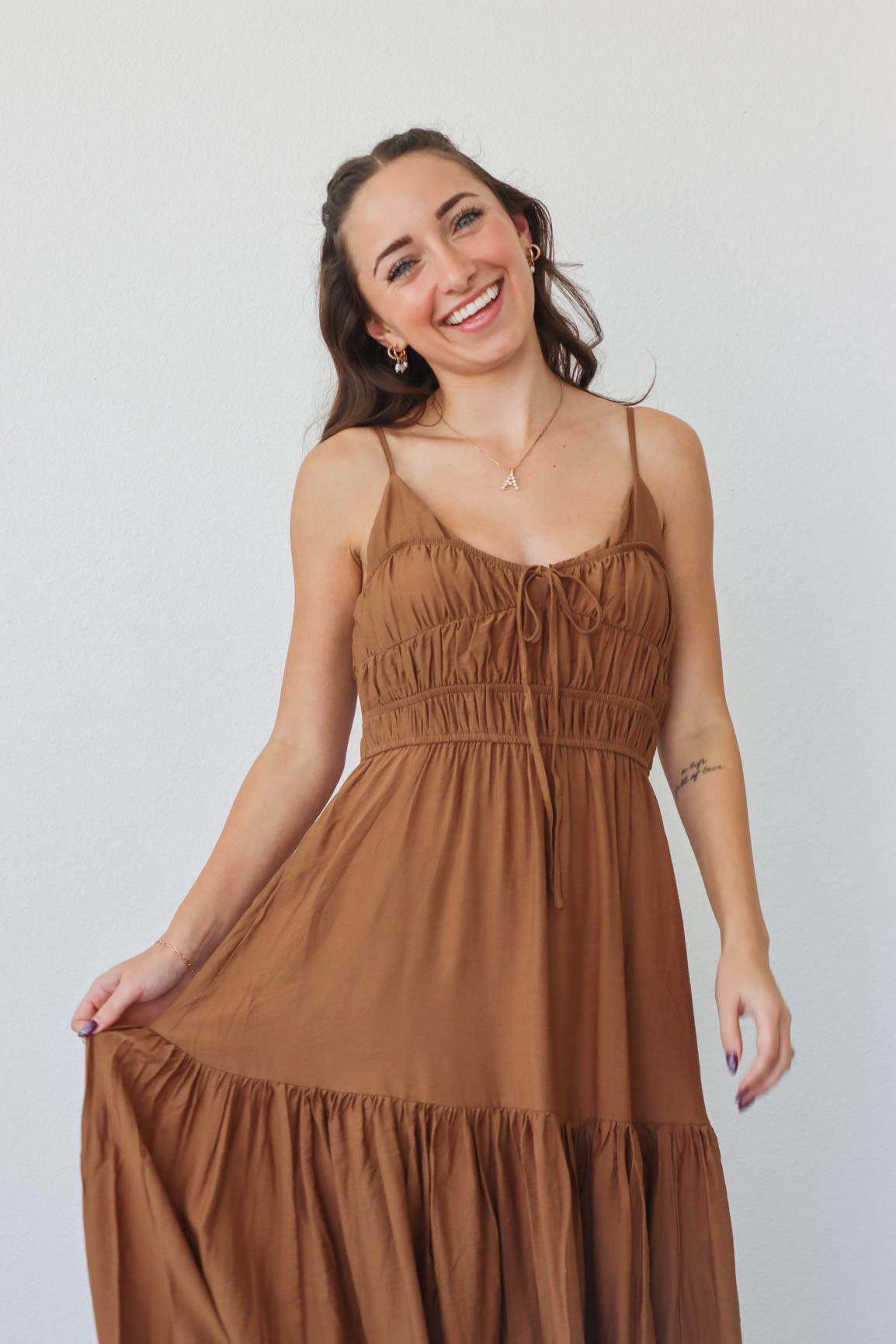 girl wearing brown maxi dress