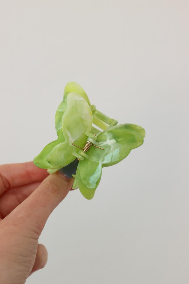 green butterfly hair clip