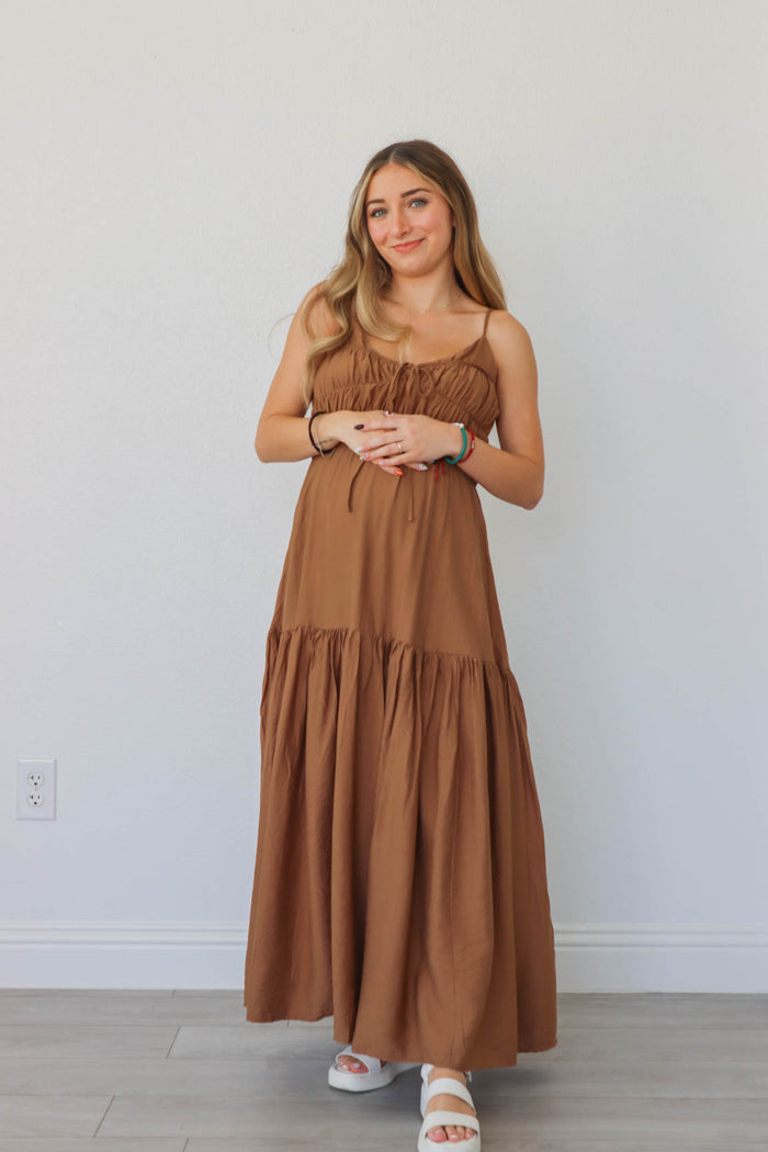 girl wearing brown maxi dress