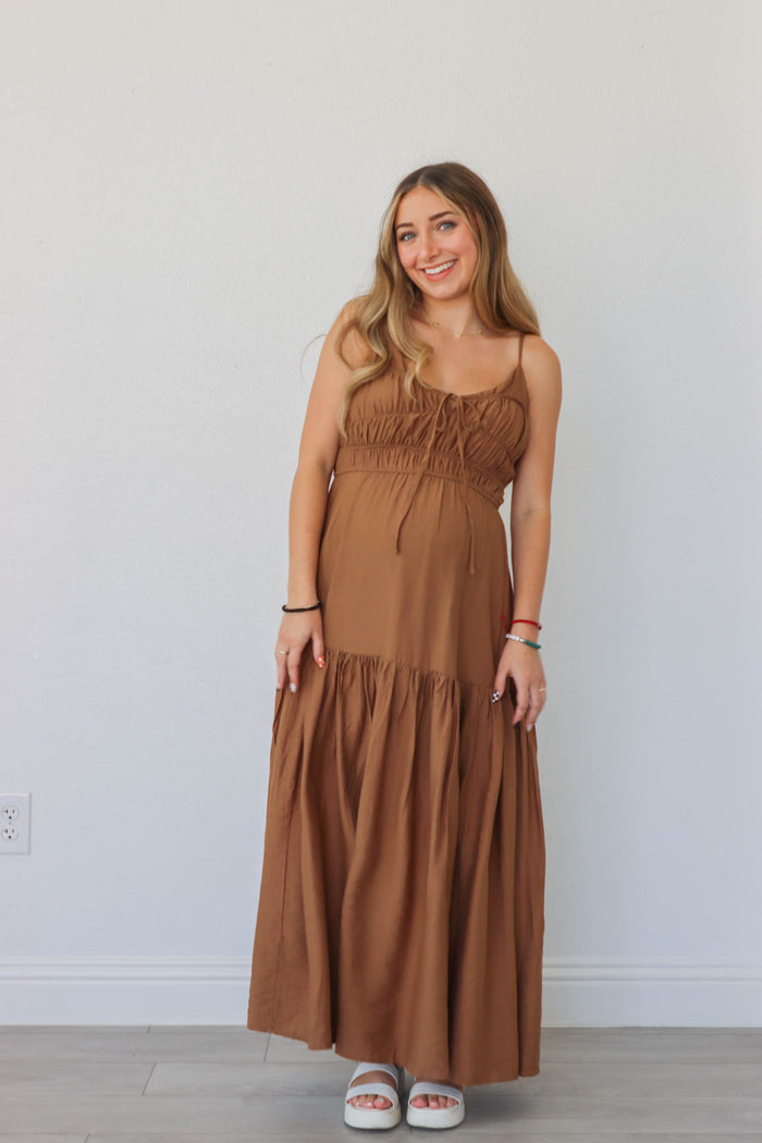 girl wearing brown maxi dress