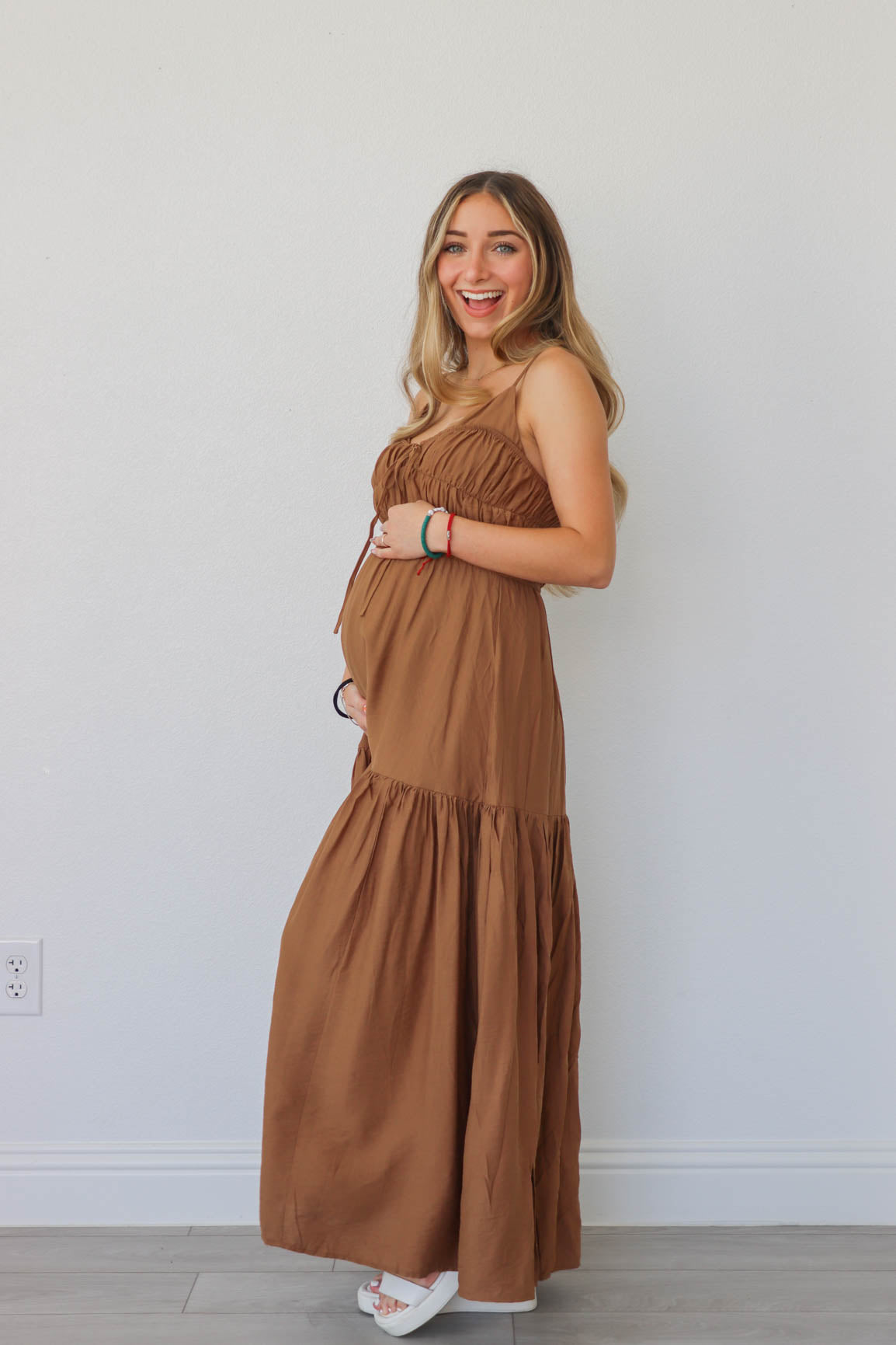 girl wearing brown maxi dress