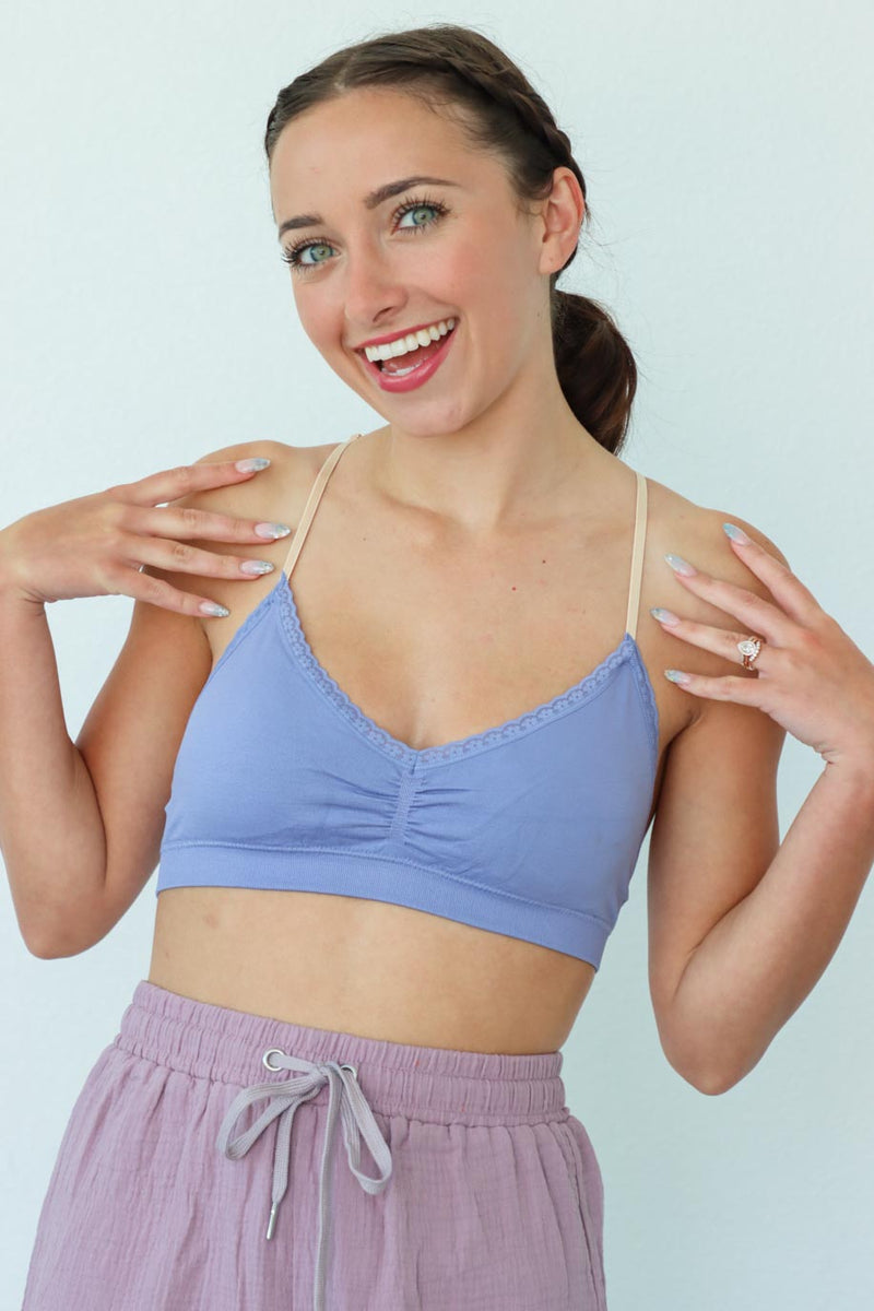 girl wearing lavender bralette top with floral lace back detailing