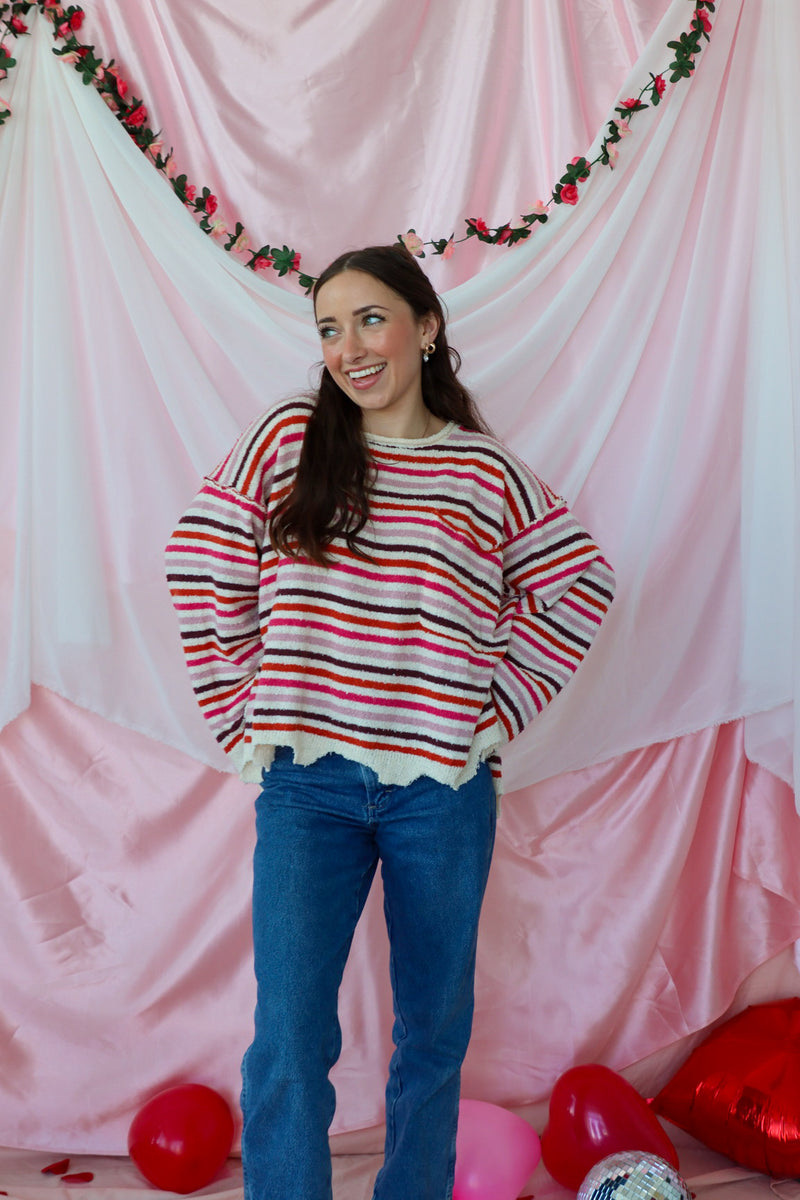 girl wearing striped sweater