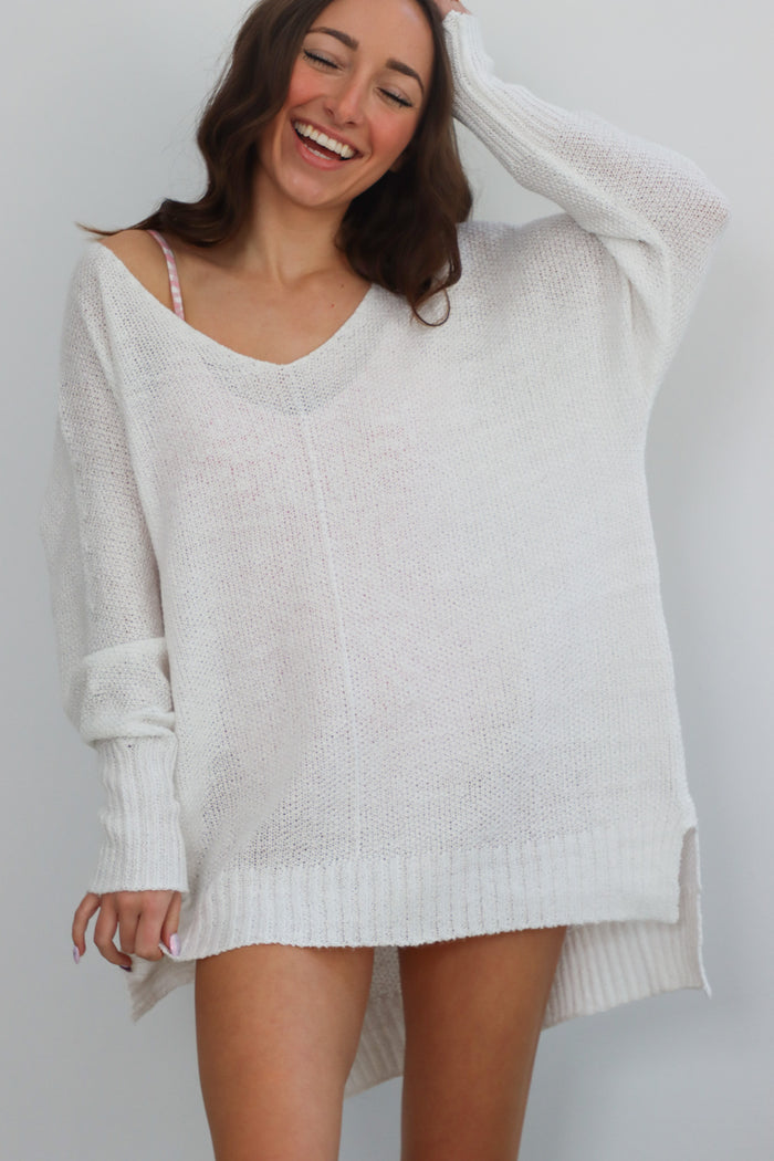 girl wearing white lightweight sweater